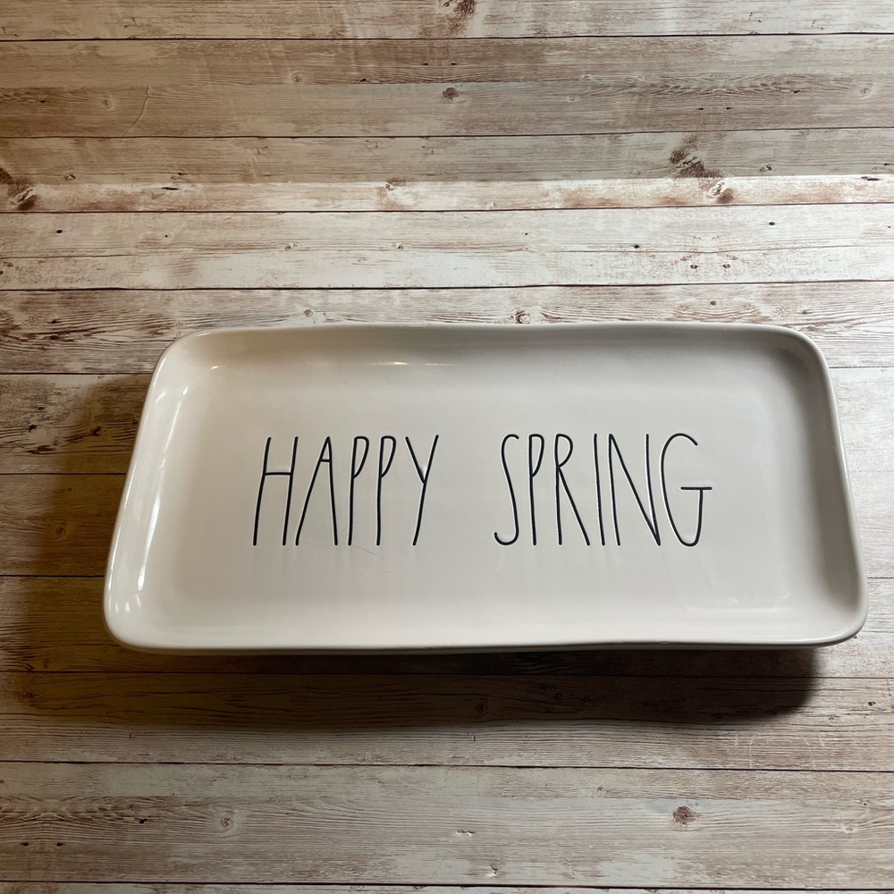 Rae Dunn ceramic tray with Happy Spring on it